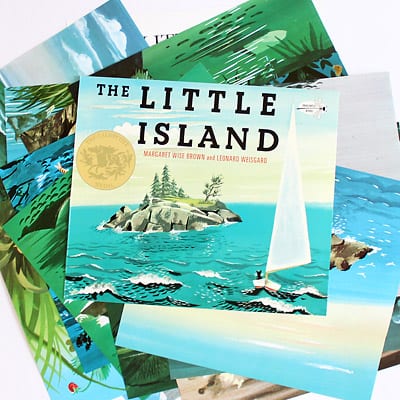 The Little Island book cover on top of fanned out pages from the book.